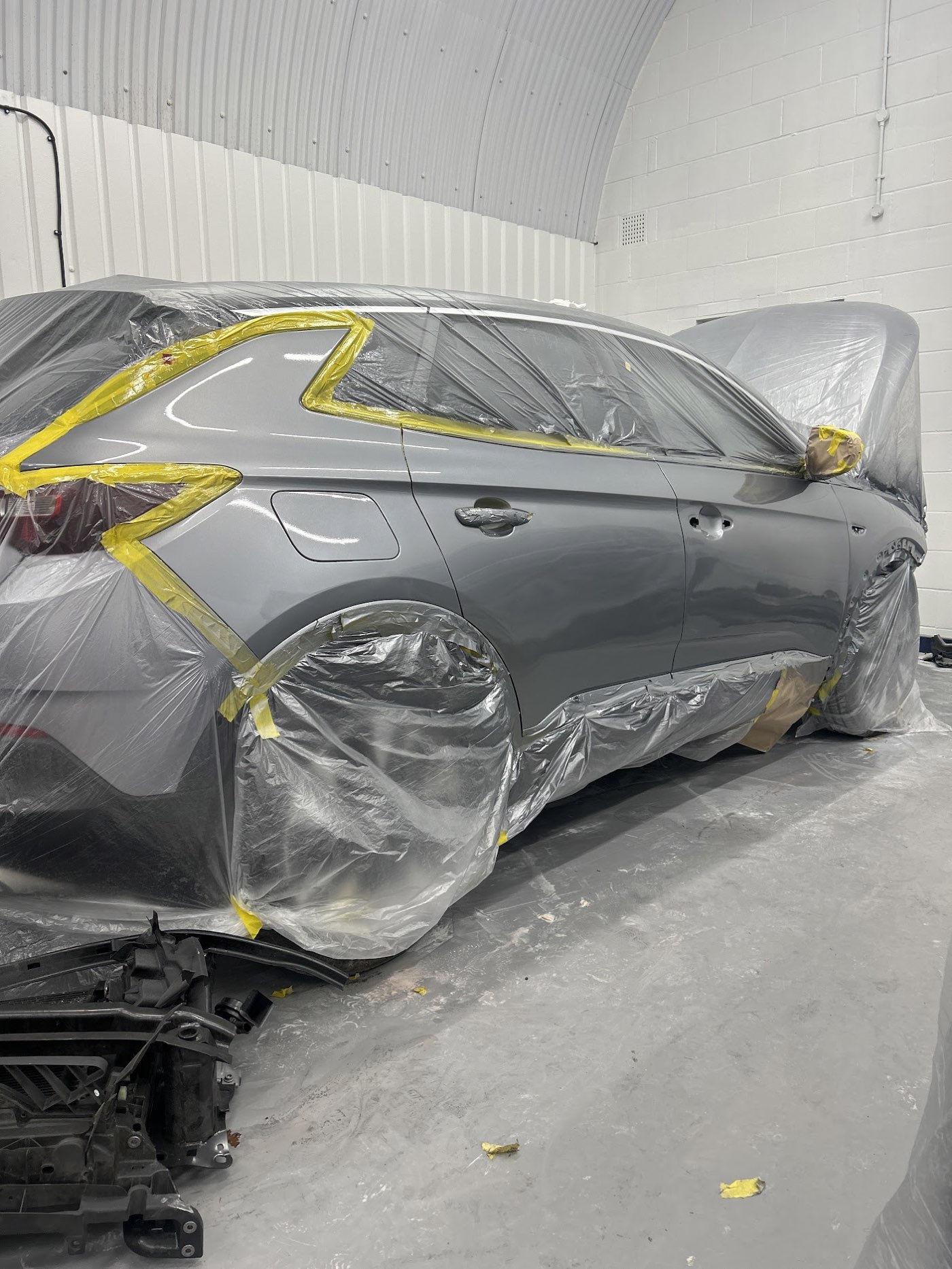 Colour-matched paint being applied at the Lukin Street workshop